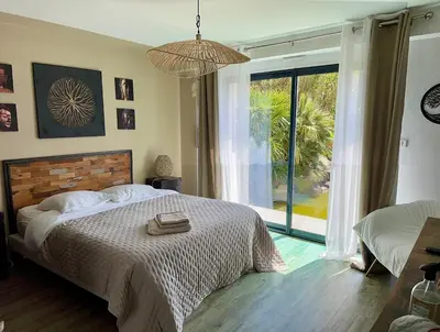 Un ou plusieurs lits dans un hébergement de l'établissement Villa du Siéck bord de mer piscine 14 P