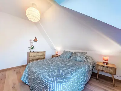 Un ou plusieurs lits dans un hébergement de l'établissement Apartment Maner roz by Interhome