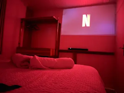 Un ou plusieurs lits dans un hébergement de l'établissement Premium suite with jacuzzi 4 étoiles