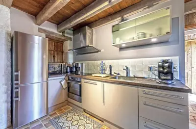 Cuisine ou kitchenette dans l'établissement Domaine de Linguinou