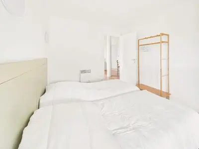 Un ou plusieurs lits dans un hébergement de l'établissement Face au Golf - Appart pour 6 avec balcon