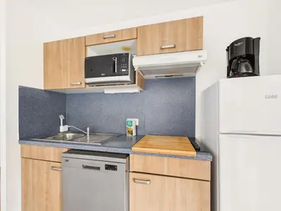 Cuisine ou kitchenette dans l'établissement Face au Golf - Appart pour 6 avec balcon