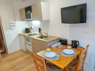 Cuisine ou kitchenette dans l'établissement Ty Angel - wifi - 1er étage