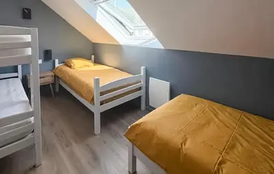 Un ou plusieurs lits dans un hébergement de l'établissement Amazing Home In Cléder With Wifi