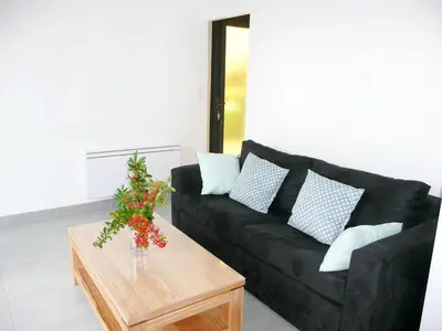 Coin salon dans l'établissement Apartment in Lilia near Kastell Ac