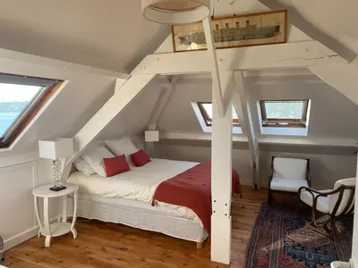 Un ou plusieurs lits dans un hébergement de l'établissement Villa Poulquer Vue mer panoramique à 180 degrés 10 personnes