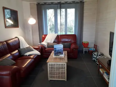 Coin salon dans l'établissement Maison de vacances