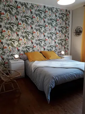 Un ou plusieurs lits dans un hébergement de l'établissement Maison de vacances