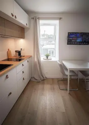 Cuisine ou kitchenette dans l'établissement Superbe studio en hypercentre