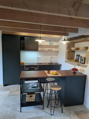 Cuisine ou kitchenette dans l'établissement Le Penty du Guerdy