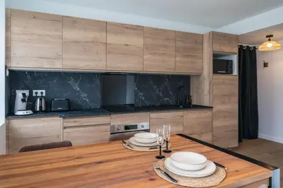 Cuisine ou kitchenette dans l'établissement La Parenthèse Sensuelle - love room