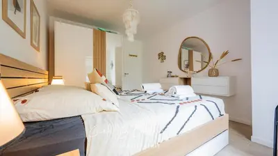 Un ou plusieurs lits dans un hébergement de l'établissement ECHAPPE ZEN Cozy secure apartment Sea and city Concarneau