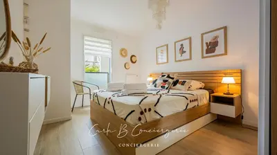 Un ou plusieurs lits dans un hébergement de l'établissement ECHAPPE ZEN Cozy secure apartment Sea and city Concarneau
