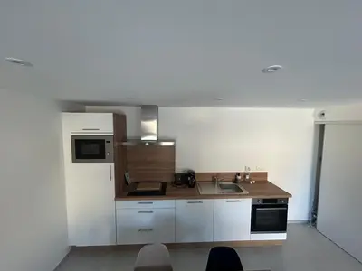 Cuisine ou kitchenette dans l'établissement Bleu horizon