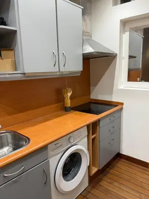 Cuisine ou kitchenette dans l'établissement Duplex de charme Quimpérois Place Saint-Corentin