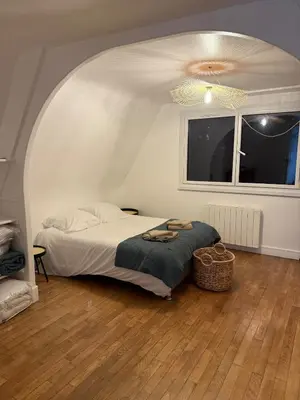 Un ou plusieurs lits dans un hébergement de l'établissement Duplex de charme Quimpérois Place Saint-Corentin