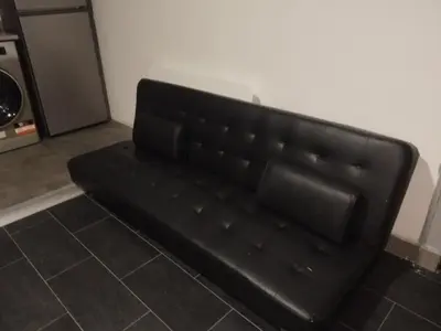 Coin salon dans l'établissement Appartement BREST tout confort avec internet et TV dans la chambre et le salon