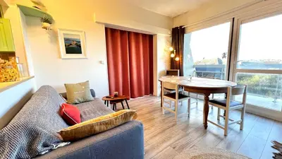 Coin salon dans l'établissement appartement kerpoupette