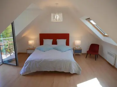 Un ou plusieurs lits dans un hébergement de l'établissement Holiday home with partial sea view, Douarnenez