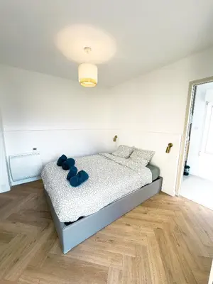 Un ou plusieurs lits dans un hébergement de l'établissement Hypercentre Siam - Appartement calme et lumineux