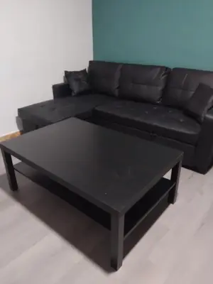 Coin salon dans l'établissement Appartement 3 Kerinou BREST avec TV dans la chambre & le salon