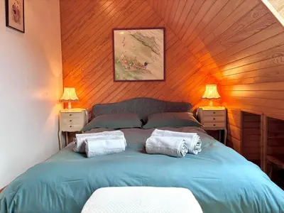 Un ou plusieurs lits dans un hébergement de l'établissement La maison d'Evania - vue mer