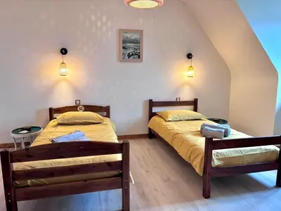 Un ou plusieurs lits dans un hébergement de l'établissement La maison d'Evania - vue mer