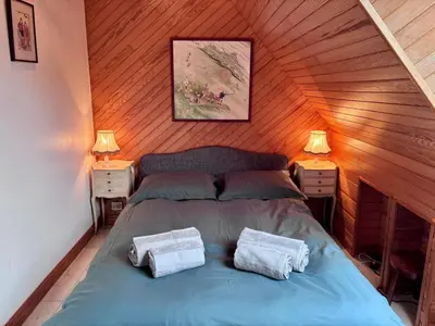 Un ou plusieurs lits dans un hébergement de l'établissement La maison d'Evania - vue mer