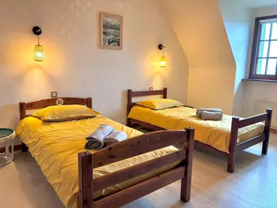Un ou plusieurs lits dans un hébergement de l'établissement La maison d'Evania - vue mer