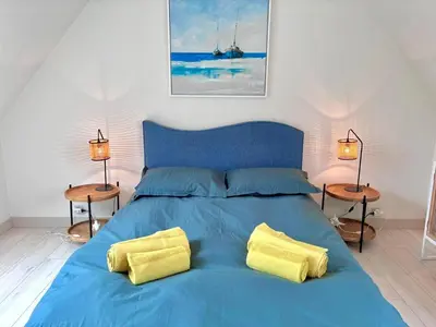 Un ou plusieurs lits dans un hébergement de l'établissement La maison d'Evania - vue mer