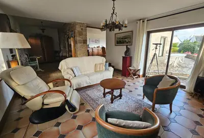 Coin salon dans l'établissement La maison d'Evania - vue mer
