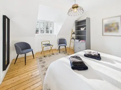Un ou plusieurs lits dans un hébergement de l'établissement Loki Rivoli Cottage