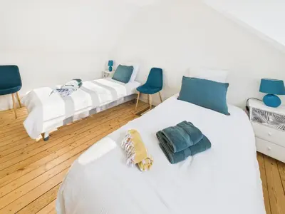 Un ou plusieurs lits dans un hébergement de l'établissement Loki Rivoli Cottage