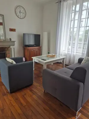 Télévision ou salle de divertissement dans l'établissement La maison d'Agnes