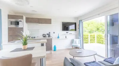 Cuisine ou kitchenette dans l'établissement Le Theven