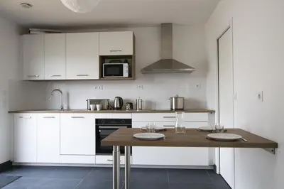 Cuisine ou kitchenette dans l'établissement Maison neuve - Vue Mer - port de l'Aberwrac'h