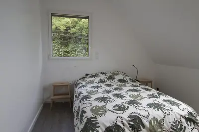 Un ou plusieurs lits dans un hébergement de l'établissement Maison neuve - Vue Mer - port de l'Aberwrac'h