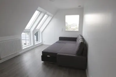 Un ou plusieurs lits dans un hébergement de l'établissement Maison neuve - Vue Mer - port de l'Aberwrac'h