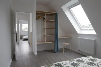 Un ou plusieurs lits dans un hébergement de l'établissement Maison neuve - Vue Mer - port de l'Aberwrac'h