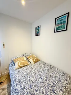 Un ou plusieurs lits dans un hébergement de l'établissement Appartements meublés Brest centre