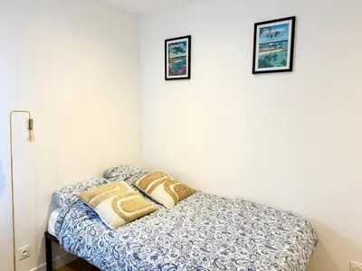 Un ou plusieurs lits dans un hébergement de l'établissement Appartements meublés Brest centre