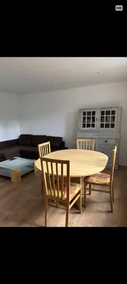 Coin salon dans l'établissement Location maison lotissement paisible
