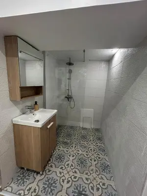Salle de bains dans l'établissement Moulin entier rénové