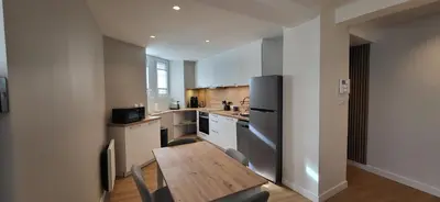 Cuisine ou kitchenette dans l'établissement T2 Hyper-centre Brest CHU Morvan & Transports