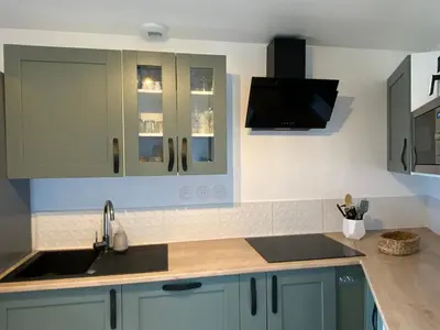Cuisine ou kitchenette dans l'établissement Appartement avec son jardin face au port d'Audierne