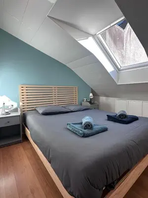 Un ou plusieurs lits dans un hébergement de l'établissement Quimper centre Duplex 2 chambres 3 étoiles - Retro Gaming