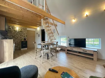 Télévision ou salle de divertissement dans l'établissement Kervel - Cocon Breton avec WiFi et Parking