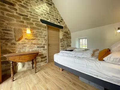 Un ou plusieurs lits dans un hébergement de l'établissement Kervel - Cocon Breton avec WiFi et Parking