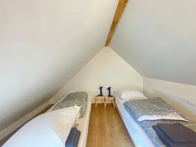 Un ou plusieurs lits dans un hébergement de l'établissement Kervel - Cocon Breton avec WiFi et Parking