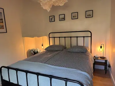 Un ou plusieurs lits dans un hébergement de l'établissement Ty Palud Gîte, piscine chauffée, spa et air marin